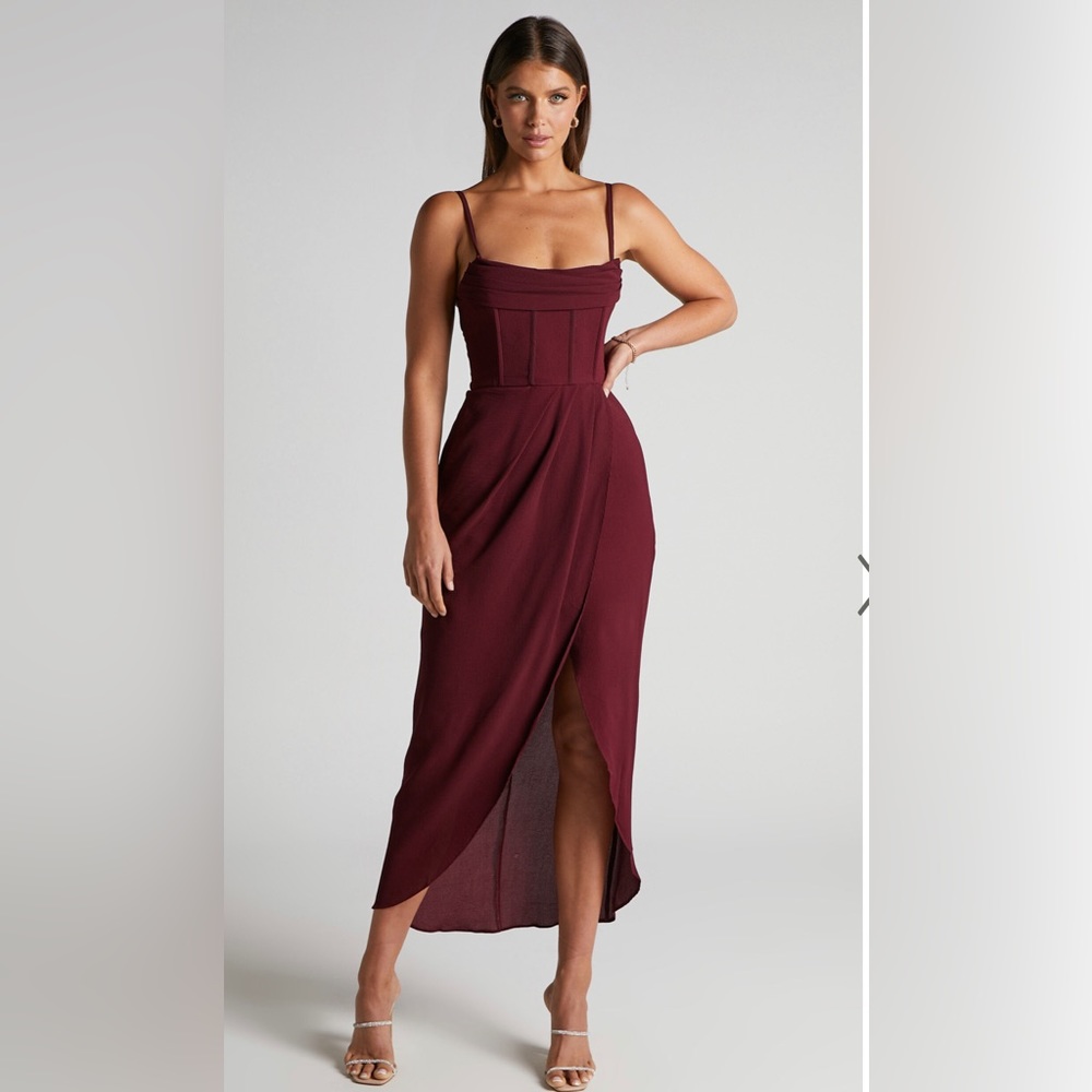 Wine/burgundy colored midi dress with corset style top. Perfect for weddings!